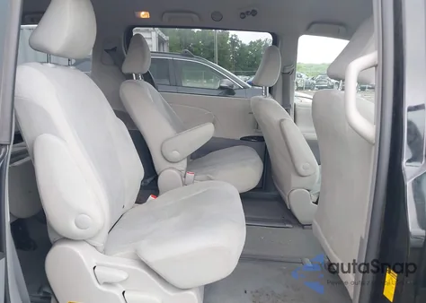 2014 Toyota Sienna L V6 7 Passenger z USA, uszkodzony, nr VIN 5TDZK3DC8ES523889